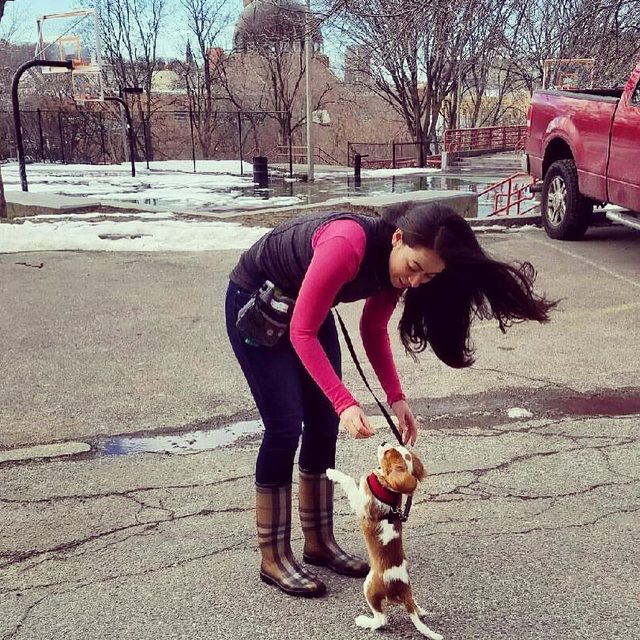 Coach Carmen DaRocha with her puppy Remy